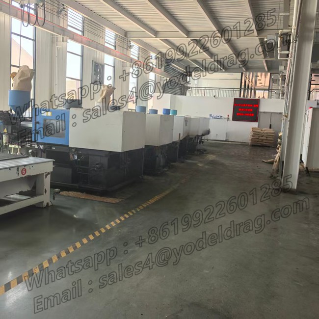 Automated injection molding machine line in factory manufacturing high-precision PA66 miniature cable carriers